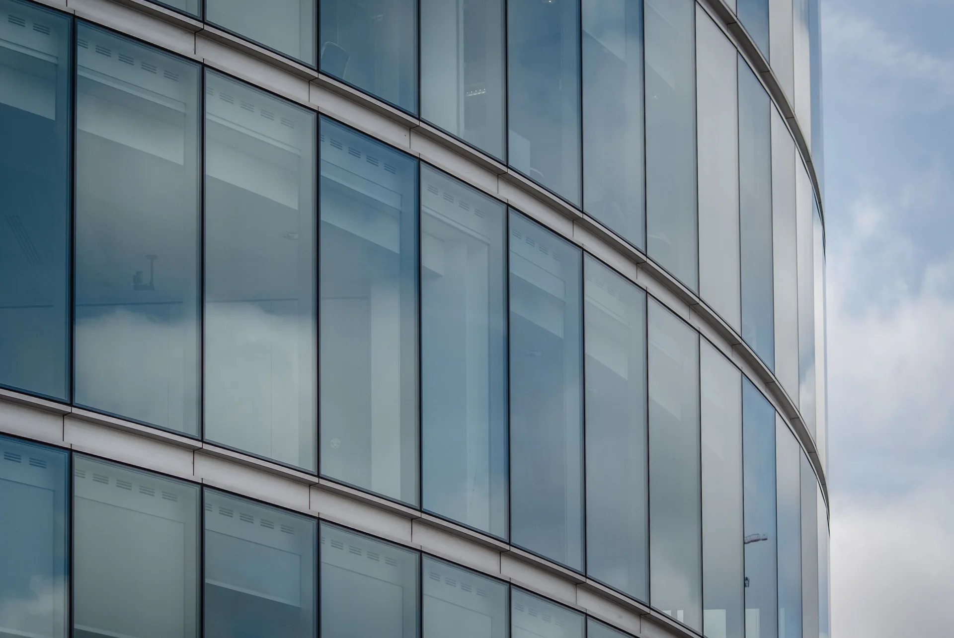 Glass architecture reflecting the sky